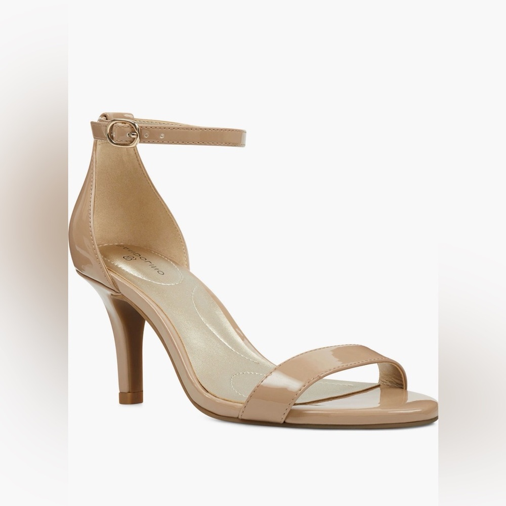 beige Bandolino Madia heels feature an open toe an adjustable ankle strap.